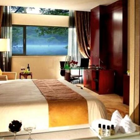 New Century Fengming Resort Zaozhuang Ruang foto