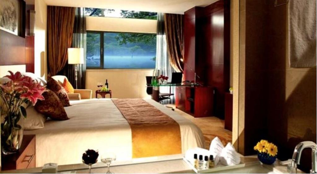 New Century Fengming Resort Zaozhuang Ruang foto